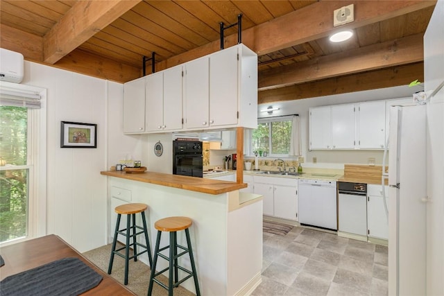 47 Red Bud Ct, Sapphire, NC 28774 - kitchen featuring white appliances, wood ceiling with exposed beams, a sink, white cabinetry, and a breakfast bar