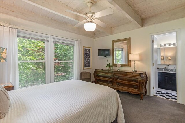 47 Red Bud Ct, Sapphire, NC 28774 - carpeted bedroom featuring wooden ceiling with exposed beams, a sink, ceiling fan, and connected bathroom