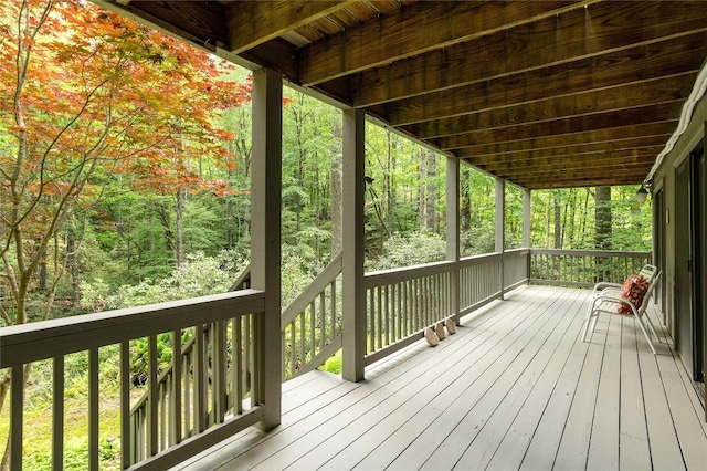 47 Red Bud Ct, Sapphire, NC 28774 - wooden terrace featuring a wooded view