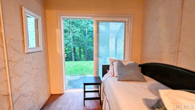 bedroom featuring hardwood / wood-style flooring