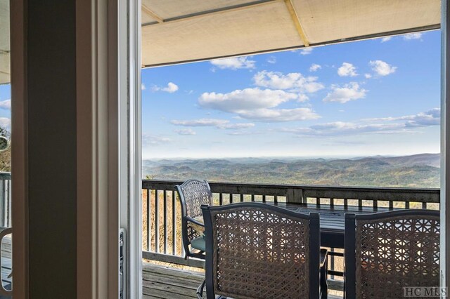 balcony featuring a mountain view