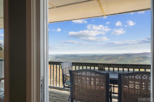 balcony featuring a mountain view