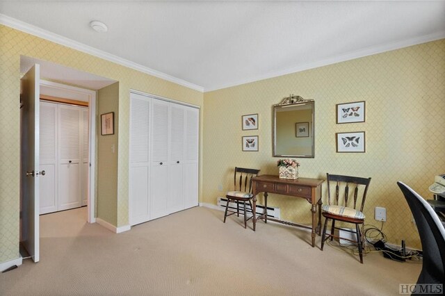 sitting room featuring crown molding, a baseboard radiator, and light carpet