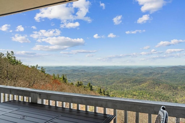 balcony featuring a mountain view