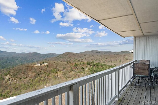 balcony featuring a mountain view