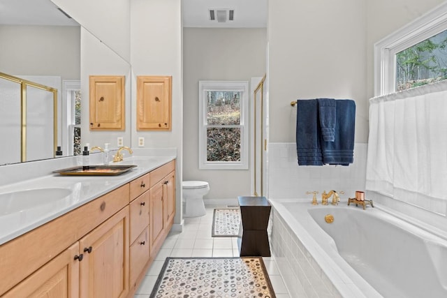 full bath featuring tile patterned floors, plenty of natural light, a stall shower, and a bath