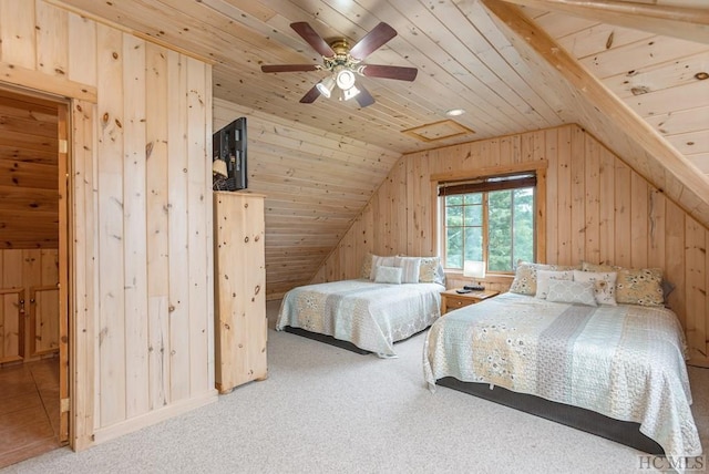 carpeted bedroom with lofted ceiling, wooden walls, wooden ceiling, and ceiling fan