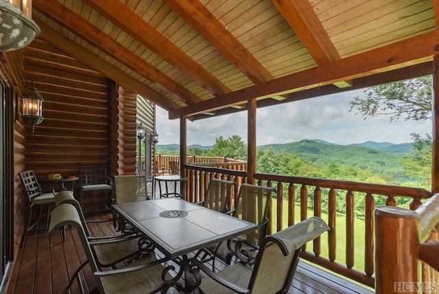 wooden terrace featuring a mountain view