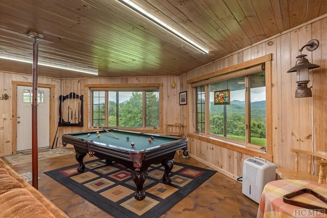 playroom with wood walls, a mountain view, billiards, and wooden ceiling