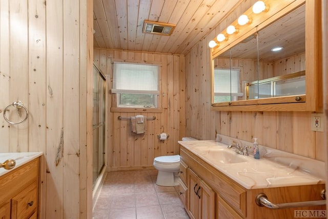 bathroom with wood ceiling, vanity, a shower with shower door, and wood walls