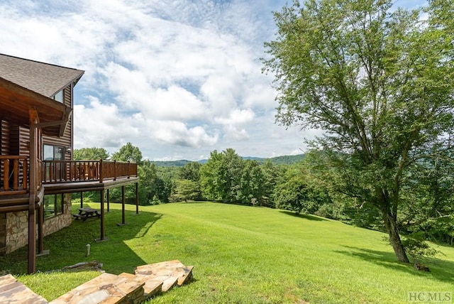 view of yard featuring a deck