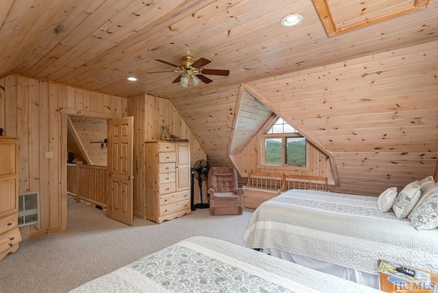 bedroom with wooden walls, lofted ceiling, ceiling fan, wood ceiling, and light carpet