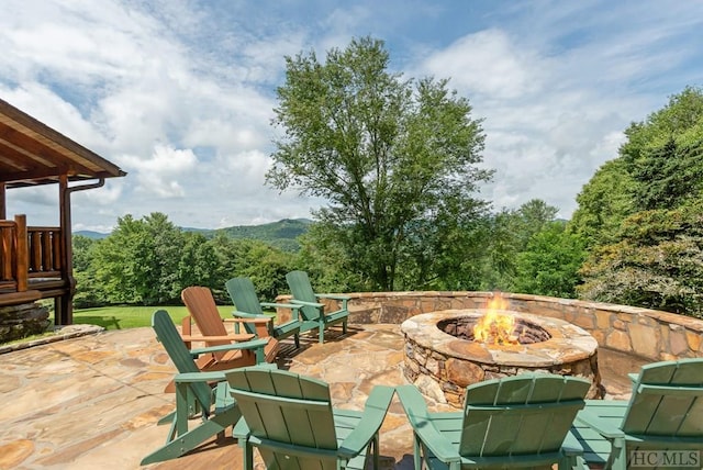 view of patio featuring an outdoor fire pit