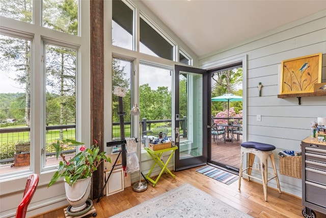 226 Sky Lake Dr, Highlands, NC 28741 - sunroom / solarium with hardwood / wood-style flooring, a wooden deck, and wood walls