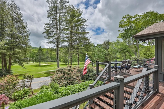 226 Sky Lake Dr, Highlands, NC 28741 - wooden deck featuring outdoor dining area and view of scattered trees