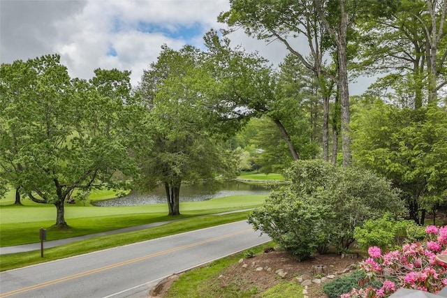 226 Sky Lake Dr, Highlands, NC 28741 - view of home's community featuring a water view, a lawn, and golf course view