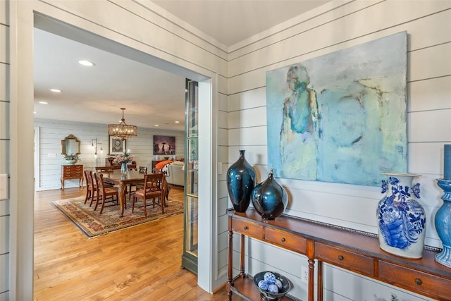 226 Sky Lake Dr, Highlands, NC 28741 - foyer featuring light wood finished floors and a chandelier