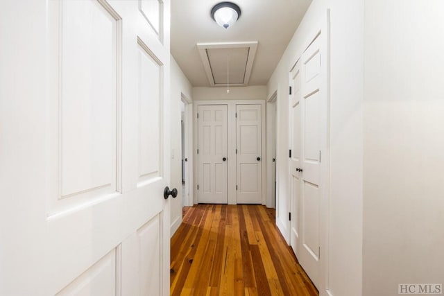 hall featuring wood-type flooring