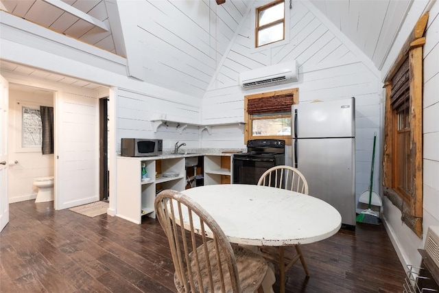 dining space with wooden walls, vaulted ceiling, dark wood-style flooring, and a wall mounted air conditioner