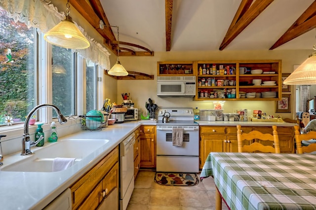 70 Fairway Ln, Sky Valley, GA 30537 - kitchen with white appliances, beam ceiling, decorative light fixtures, light countertops, and light tile patterned floors