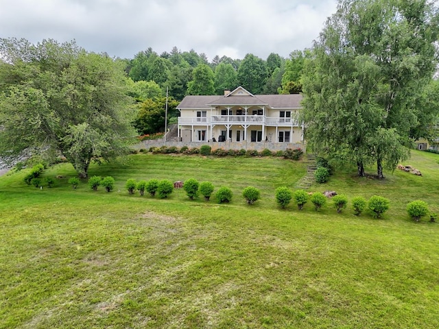 70 Fairway Ln, Sky Valley, GA 30537 - view of front of house featuring a front lawn and a forest view