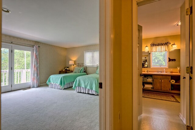 70 Fairway Ln, Sky Valley, GA 30537 - carpeted bedroom with access to exterior and ensuite bathroom