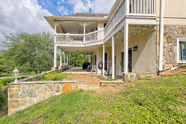 70 Fairway Ln, Sky Valley, GA 30537 - back of house featuring a patio area and stone siding