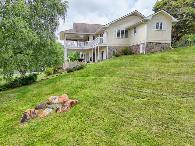 70 Fairway Ln, Sky Valley, GA 30537 - back of property featuring a balcony and a yard
