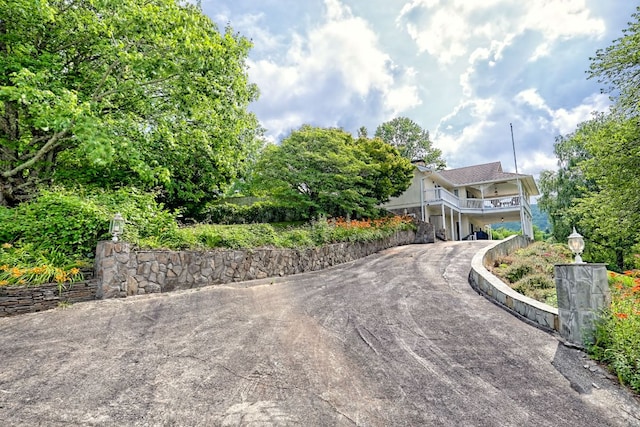 70 Fairway Ln, Sky Valley, GA 30537 - view of front of home with asphalt driveway and a balcony