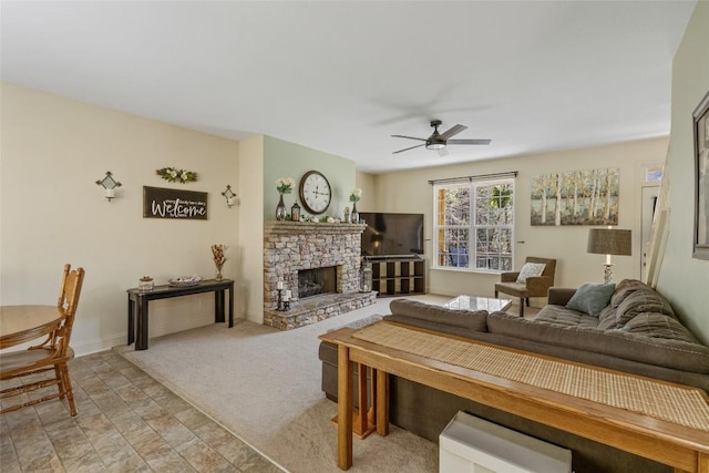 210 Triple Fork Rd, Cullowhee, NC 28723 - living area with ceiling fan and a stone fireplace