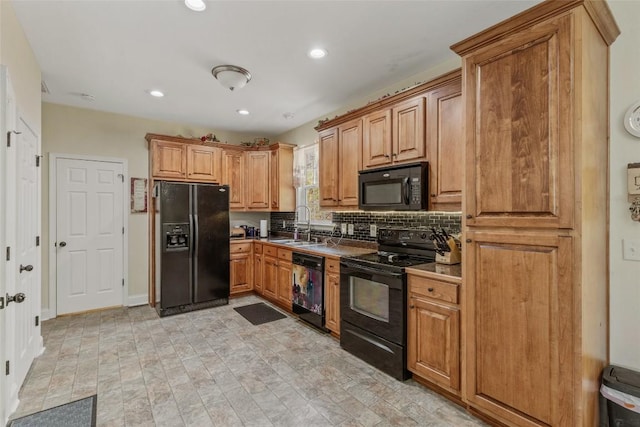 210 Triple Fork Rd, Cullowhee, NC 28723 - kitchen with black appliances, tasteful backsplash, recessed lighting, and brown cabinets