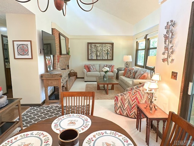 carpeted living room with vaulted ceiling