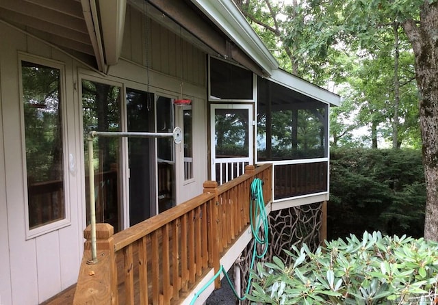 view of property exterior featuring a sunroom