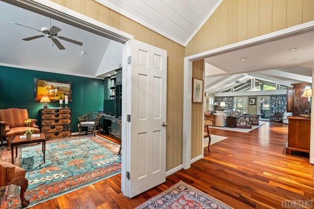 interior space featuring hardwood / wood-style flooring and lofted ceiling