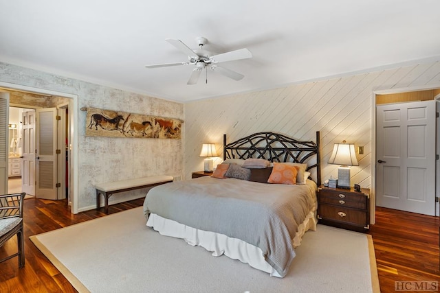 bedroom with dark wood-type flooring and ceiling fan