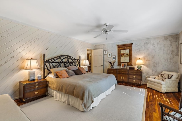 bedroom with hardwood / wood-style flooring and ceiling fan