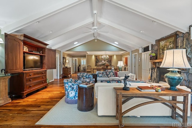 living room featuring hardwood / wood-style flooring, vaulted ceiling with beams, and ceiling fan with notable chandelier