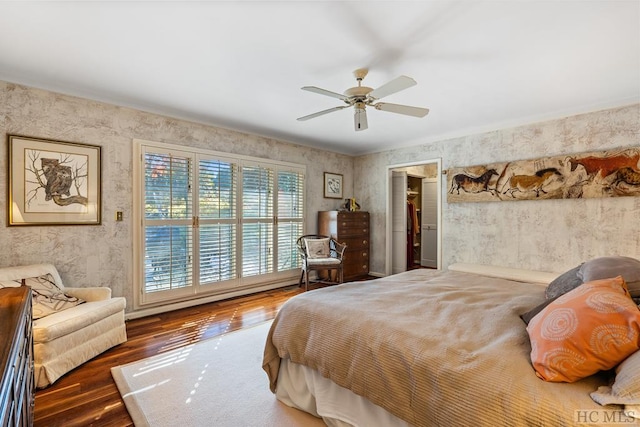 bedroom featuring dark hardwood / wood-style floors and ceiling fan