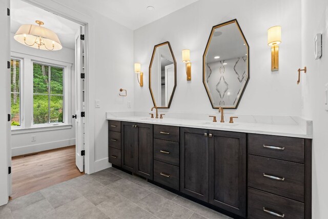 1310 New Settlers Way, Glenville, NC 28736 - full bathroom with double vanity and tile patterned flooring