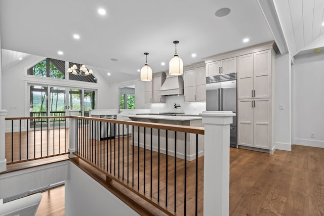 1310 New Settlers Way, Glenville, NC 28736 - kitchen with recessed lighting, light countertops, a large island, light wood finished floors, and stainless steel built in refrigerator