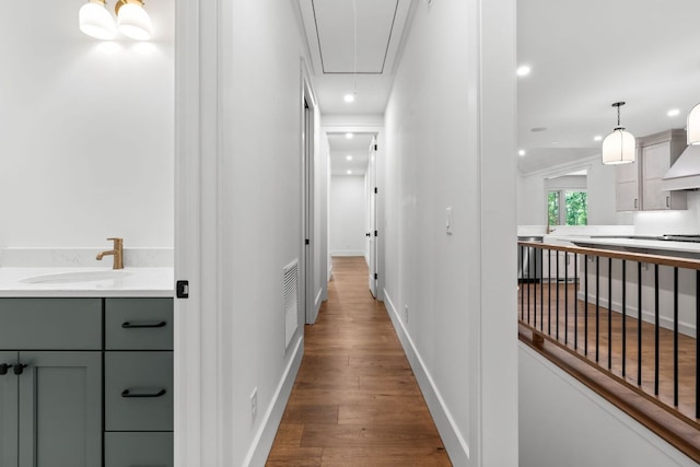 1310 New Settlers Way, Glenville, NC 28736 - hallway featuring attic access, wood finished floors, and recessed lighting