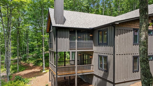 1310 New Settlers Way, Glenville, NC 28736 - rear view of property featuring a shingled roof and a chimney