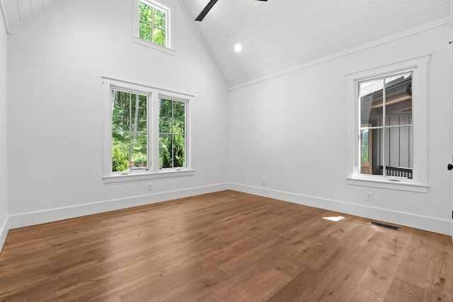 1310 New Settlers Way, Glenville, NC 28736 - unfurnished room with ceiling fan, high vaulted ceiling, and wood finished floors