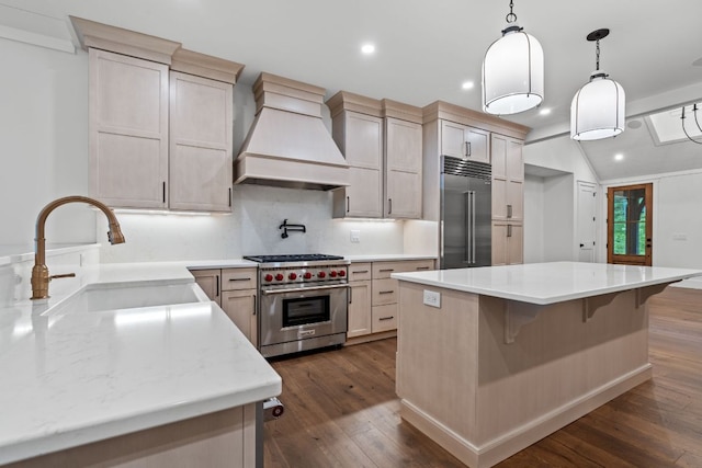 1310 New Settlers Way, Glenville, NC 28736 - kitchen with high quality appliances, dark wood-style floors, custom exhaust hood, a kitchen island, and recessed lighting