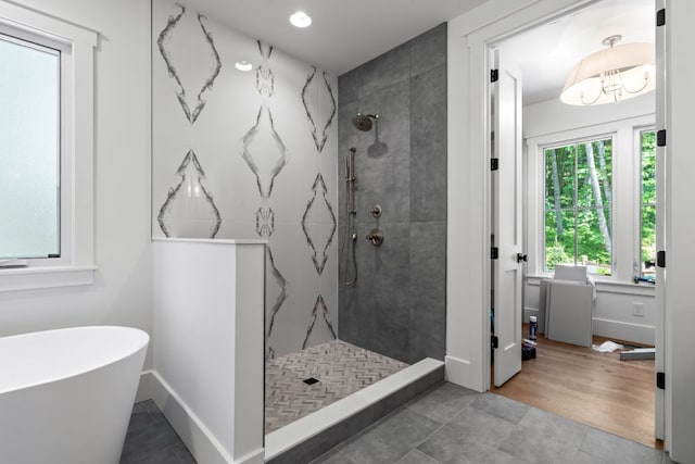 1310 New Settlers Way, Glenville, NC 28736 - bathroom featuring tiled shower, a soaking tub, recessed lighting, and tile patterned floors