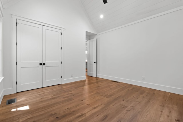 1310 New Settlers Way, Glenville, NC 28736 - unfurnished bedroom featuring wood finished floors, high vaulted ceiling, ceiling fan, and wooden ceiling