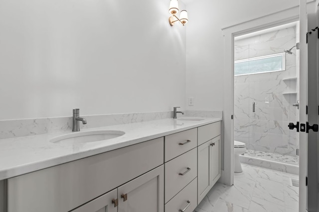 1310 New Settlers Way, Glenville, NC 28736 - bathroom with a marble finish shower, double vanity, and marble look tile flooring