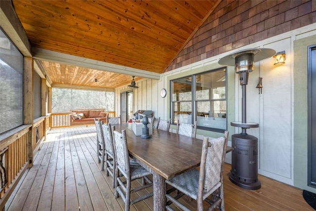 exterior space featuring lofted ceiling and wood ceiling