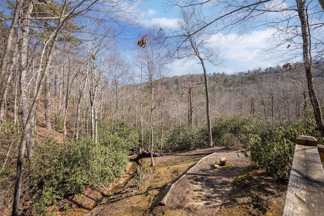 exterior space featuring a view of trees