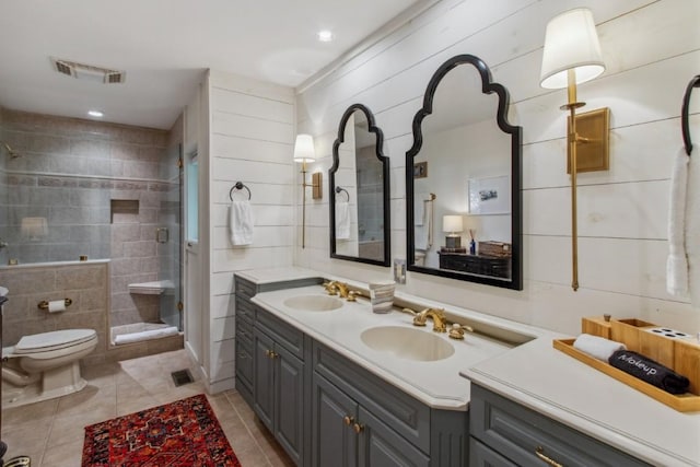 15 Elm Ct, Highlands, NC 28741 - bathroom with tile patterned floors, a shower stall, double vanity, and tile walls